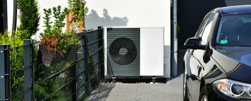 Heat pump on driveway